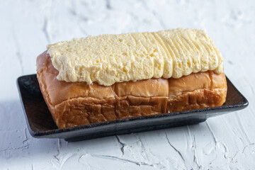Fresh butter cake on white background