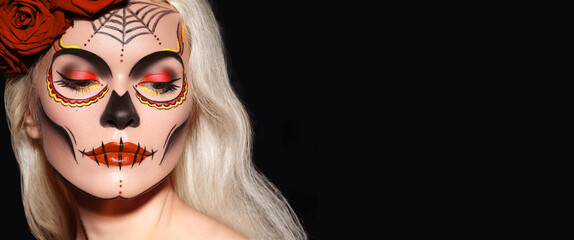 Beautiful Halloween Make-Up Style. Blond Model Wear Sugar Skull Makeup with Red Roses. Santa Muerte...
