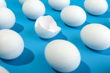 broken egg pattern on blue background