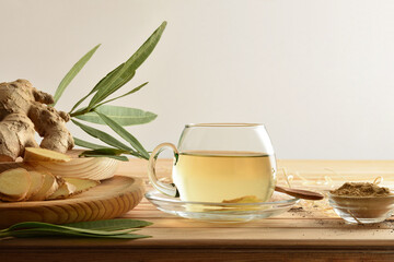 Organic ginger infusion on wooden rustic table white isolated background