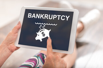 Bankruptcy concept on a tablet