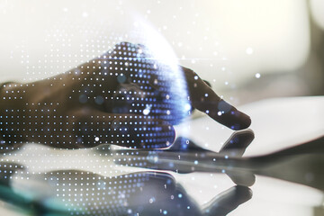 Double exposure of abstract digital world map and finger clicks on a digital tablet on background, research and strategy concept