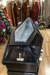 Special wooden coffin with glass insert for funerals of Covid-19 patients