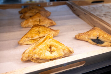 Puff pastry triangle in the bakery shop.