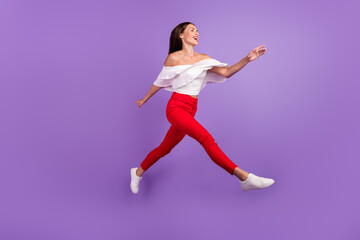 Fototapeta na wymiar Profile photo of excited lady jump run look empty space wear white blouse trousers shoes isolated purple color background
