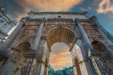 Obraz premium Arch of Septimius Severus and church of Santi Luca e Martina at the Roman Forum