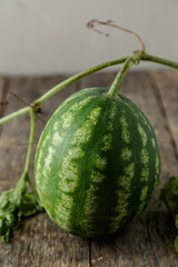 Waterelon, honey watermelon on wooden table background.
