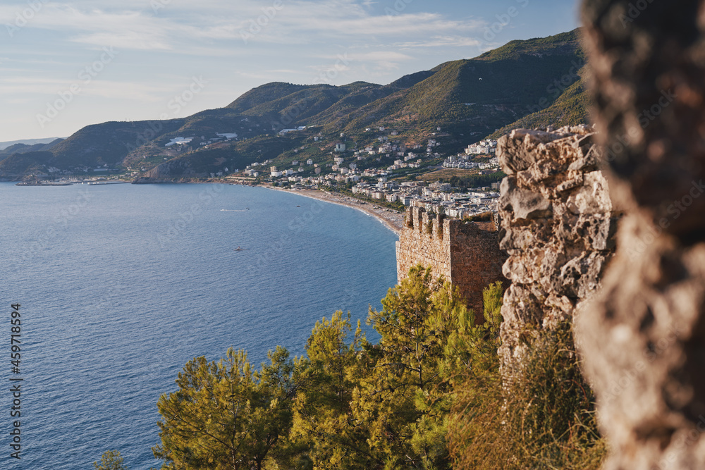 Wall mural View of the city of Alanya from the old fortress wall. Turkey, ancient castle.