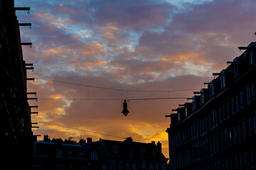 Silhouette of dutch houses at sunset in the city of Amsterdam, Netherlands