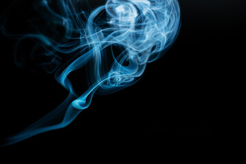 Obraz premium Abstract colored smoke moves on dark background. Wallpaper. Personal vaporizers fragrant steam. Concept of alternative non-nicotine smoking. E-cigarette. Texture. Design elements.