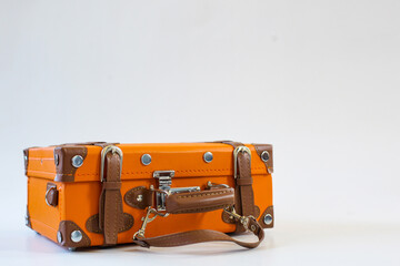 Vintage leather suitcase isolated on white background