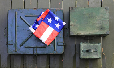 USA flag on military wooden background