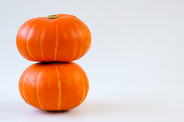 Stack of pumpkins isolated on white background