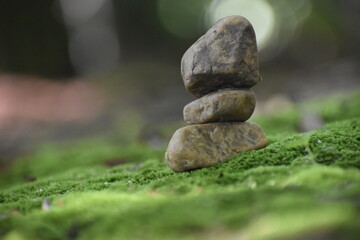 Fototapeta na wymiar zen stones on the grass