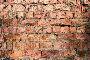 Old red broken brick wall texture background