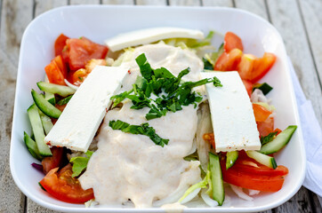 Fresh vegetable salad with feta cheese