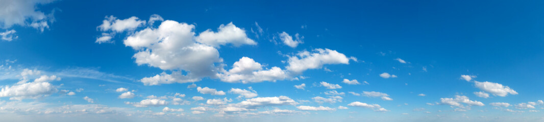 Naklejka na ściany i meble Blue Sky background with tiny Clouds. Panorama background