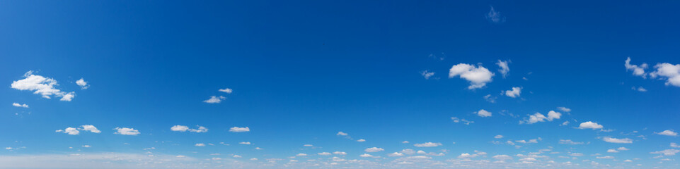 Blue Sky background with tiny Clouds. Panorama background