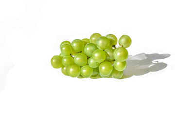 Fresh green grapes with not leaves. Isolated on white. One bunch grape. side view. Fresh fruit. High quality photo