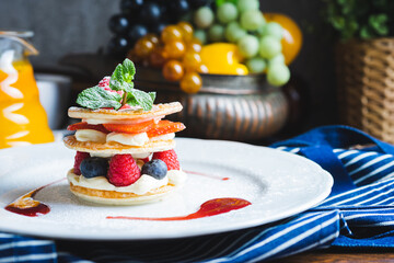 Traditional sweet pastry with three layers of airy dough with whipped cream