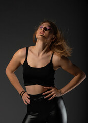 Sexy blonde in leather black pants going crazy.