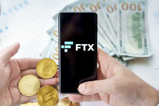 Russia Moscow 20.05.2021 FTX logo in mobile phone.Cryptocurrency decentralized exchange DEX.Trading blockchain platform.Swap,buy,sell crypto token,digital coin Bitcoin,Ethereum.Business,investing