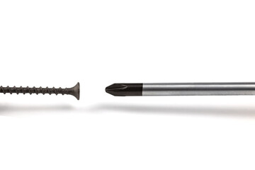 Tapping screw and screwdriver on white background, isolated, close-up 