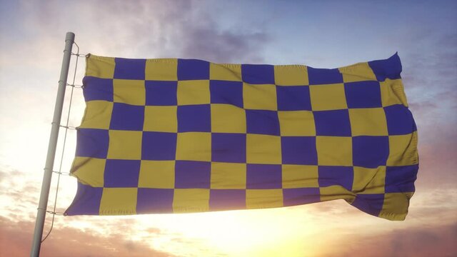 Surrey flag, England, waving in the wind, sky and sun background