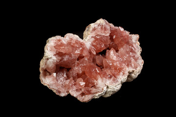 Macro mineral stone Pink Amethyst on a black background