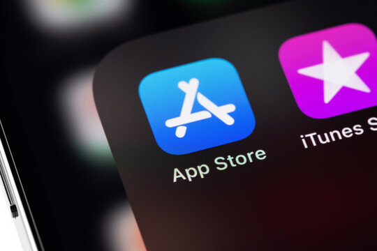 AppStore, iTunes app icons on screen Apple iPhone. Apple Inc. is an American multinational technology company. Moscow, Russia - September 14, 2021