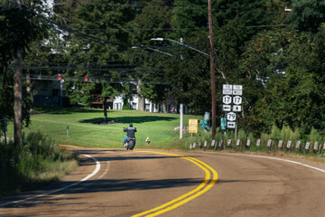 A motorcyclist gets in a ride in mid-September here at the intersection of route 79 and chapel...