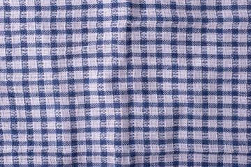texture of blue checkered cloth towel close-up
