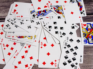 Playing cards lying on the table. Poker.