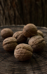 walnut on wooden background close up