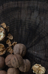 walnut on wooden background close up