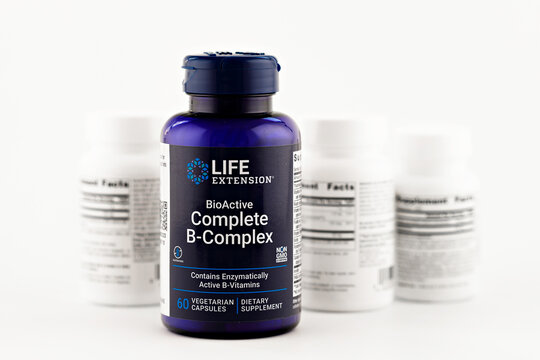 Complete B-Complex capsules in the jar. dietary supplement editorial photo
