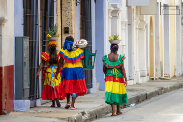 Fototapeta na wymiar Traditional colorful fruit street vendors in Cartagena de Indias called Palenqueras