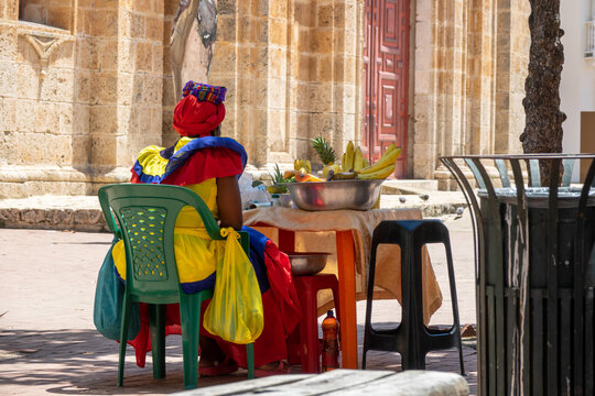 Traditional colorful fruit street vendors in Cartagena de Indias called Palenqueras