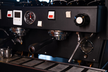details of dark loft coffee shop. professional coffee machine close up.