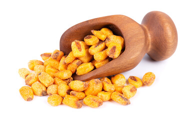 Roasted salted corn nuts in wooden scoop, isolated on white background. Beer snack, dry corn with spices.