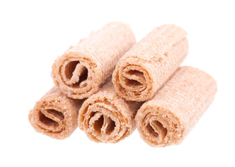 Crispy wafer rolls isolated on white background. Cinnamon flavored waffle.