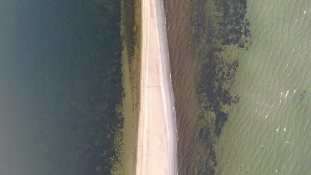 Flying over the sandbar in Rewa village at the Baltic Sea in Poland, Europe