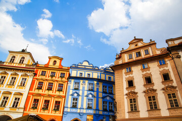 Fototapeta premium Colorful house facades at market square in Prague, Czech Republic. Gothic architecture in old European cities. Urban landmarks and popular travel destinations.