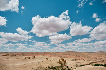 Fairy chimneys and geologic and natural stones in valley with blue sky and dessert in Turkey