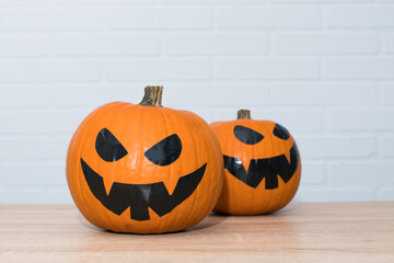 natural pumpkins with halloween face