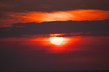 red sunset by the sea