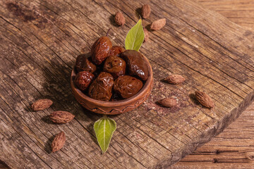Sun-dried olives in a ceramic bowl