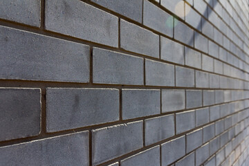 Background of brick wall. Gray brick close-up