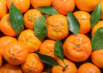 Fresh mandarin oranges fruit or tangerines as background