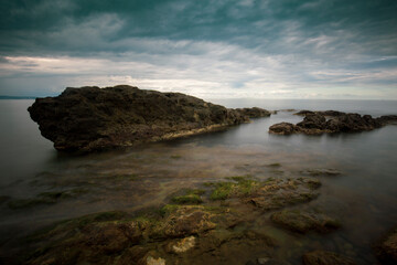 Rocks, soft sea and clouds in the sky, beautiful landscape in long exposure photography. Of, Trabzon,Turkey